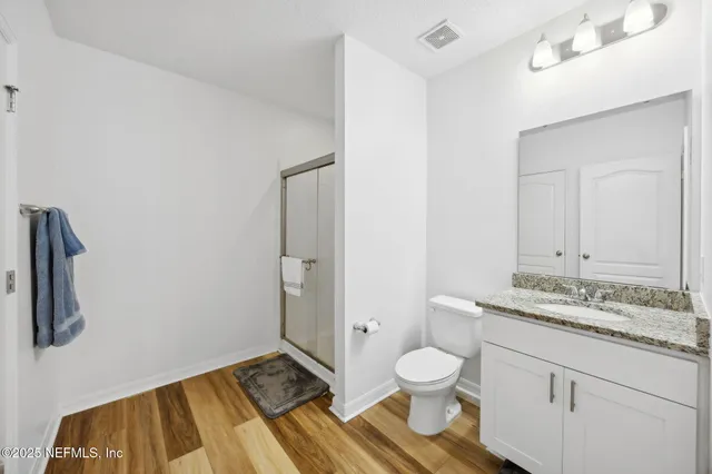 a view of a playground with basketball court