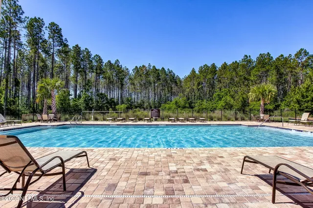 a view of a park with swings and slides