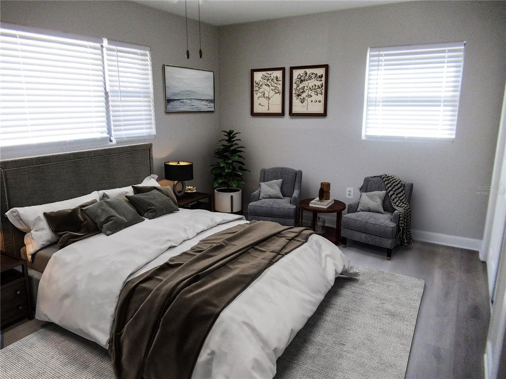 1798 Faulds Road North Clearwater, FL 33756 - Photo 17 of 34 a bedroom with two beds and a window