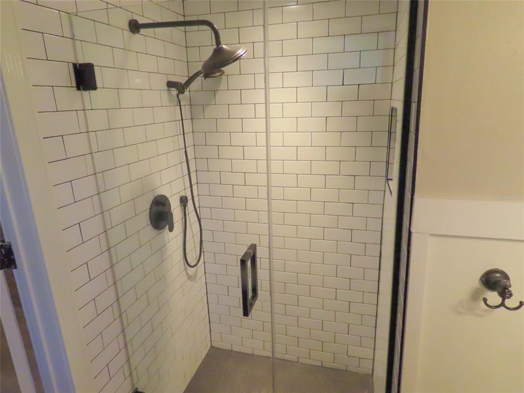 1798 Faulds Road North Clearwater, FL 33756 - Photo 22 of 34 a bathroom with a shower