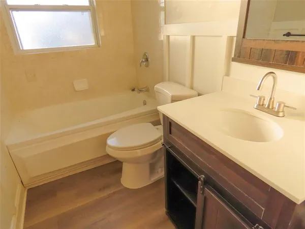 a view of a room with a furniture