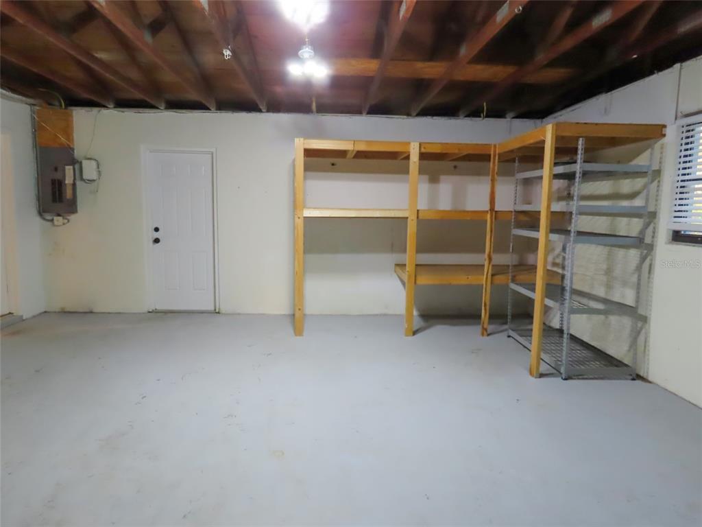 1798 Faulds Road North Clearwater, FL 33756 - Photo 28 of 34 a view of an empty room with a window