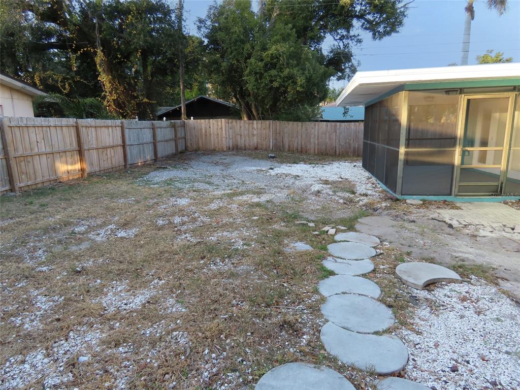 1798 Faulds Road North Clearwater, FL 33756 - Photo 30 of 34 a view of a backyard