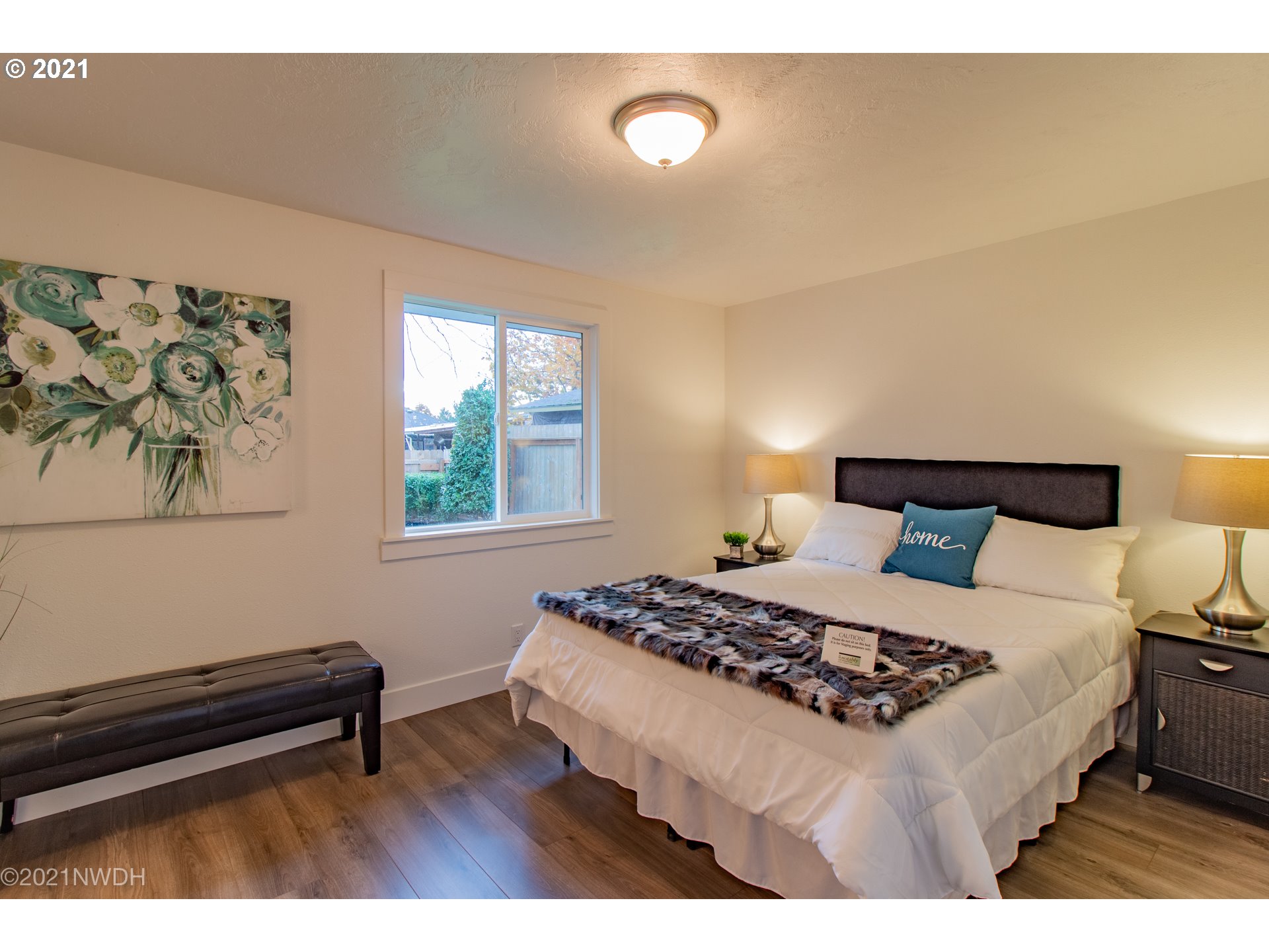 1481 T Street Springfield, OR 97477 - Photo 11 of 21 a bedroom with a bed and a window