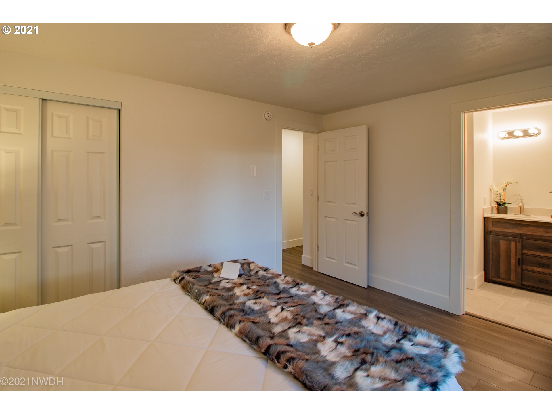 1481 T Street Springfield, OR 97477 - Photo 12 of 21 a bedroom with a bed and a view of bathroom