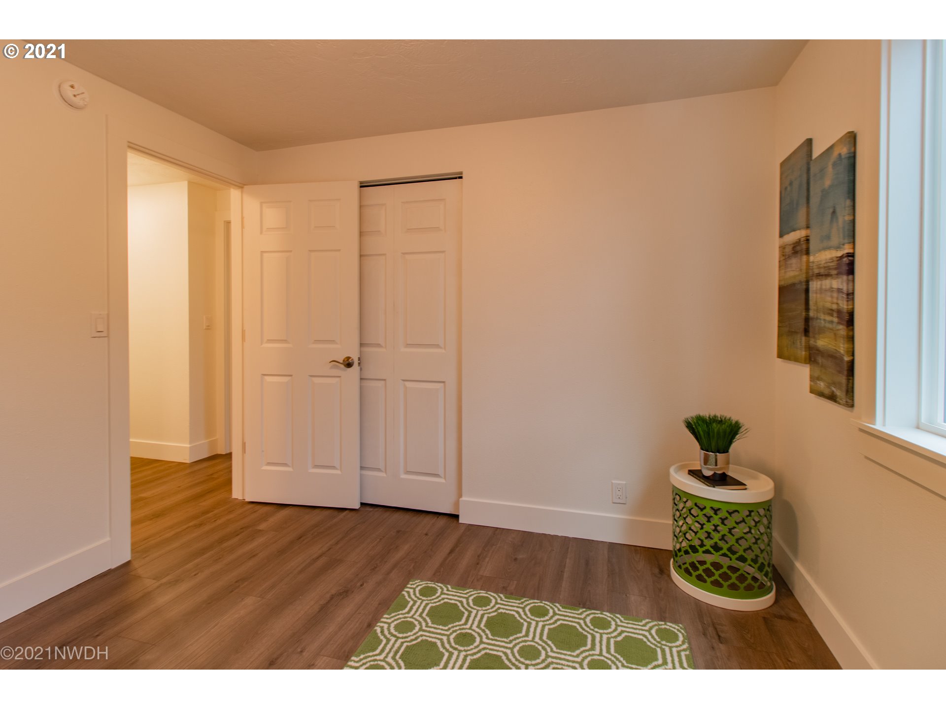 1481 T Street Springfield, OR 97477 - Photo 15 of 21 a view of a hallway with wooden floor