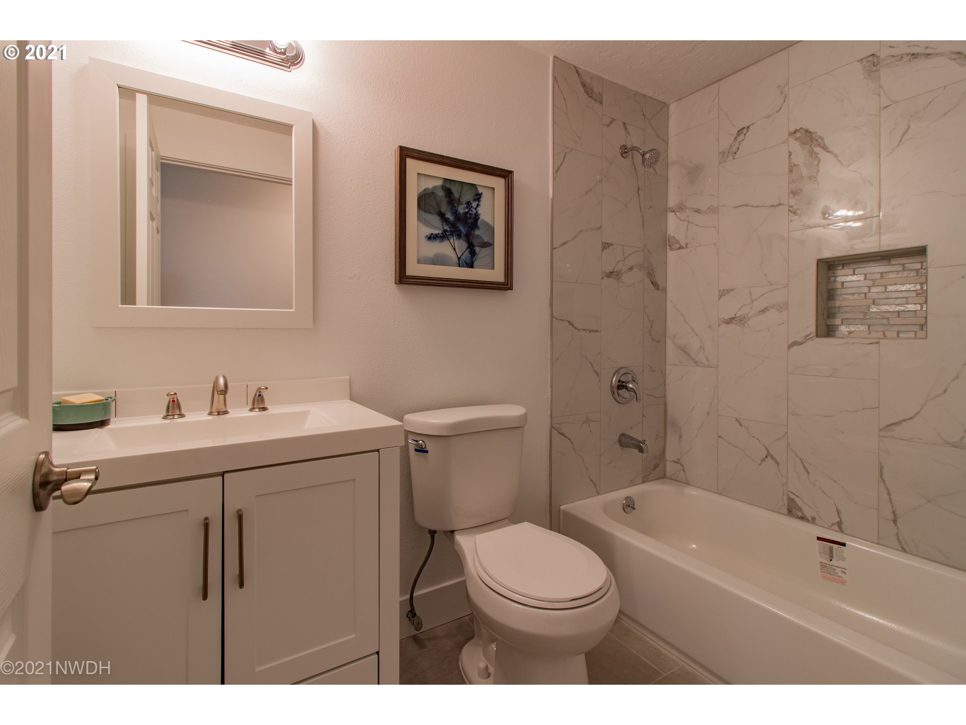 1481 T Street Springfield, OR 97477 - Photo 18 of 21 a bathroom with a sink a toilet and shower