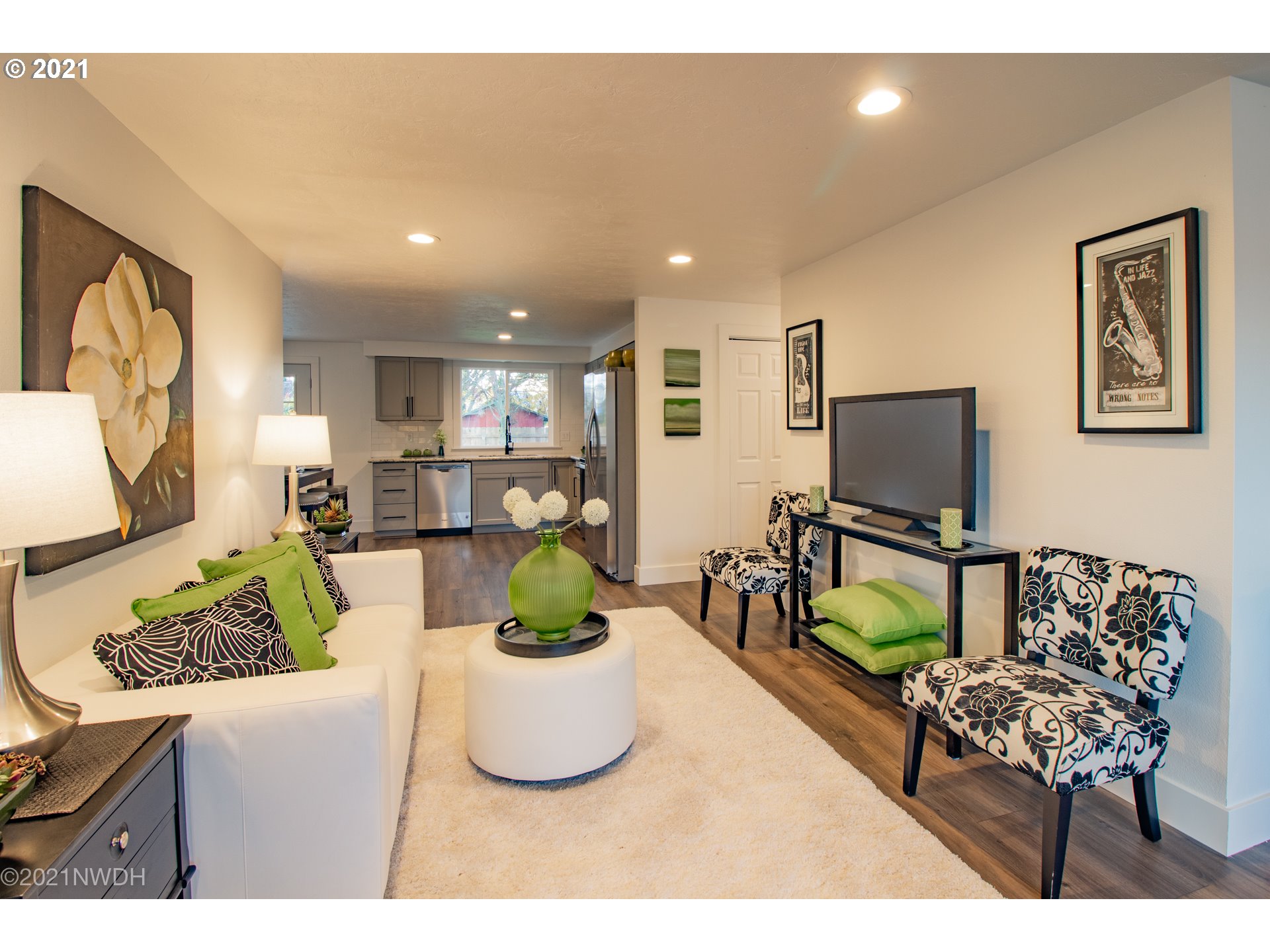1481 T Street Springfield, OR 97477 - Photo 5 of 21 a living room with furniture and a flat screen tv