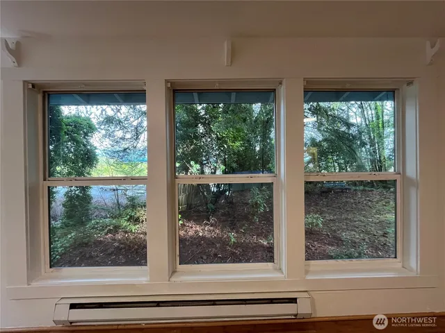 a view of a room that has a window