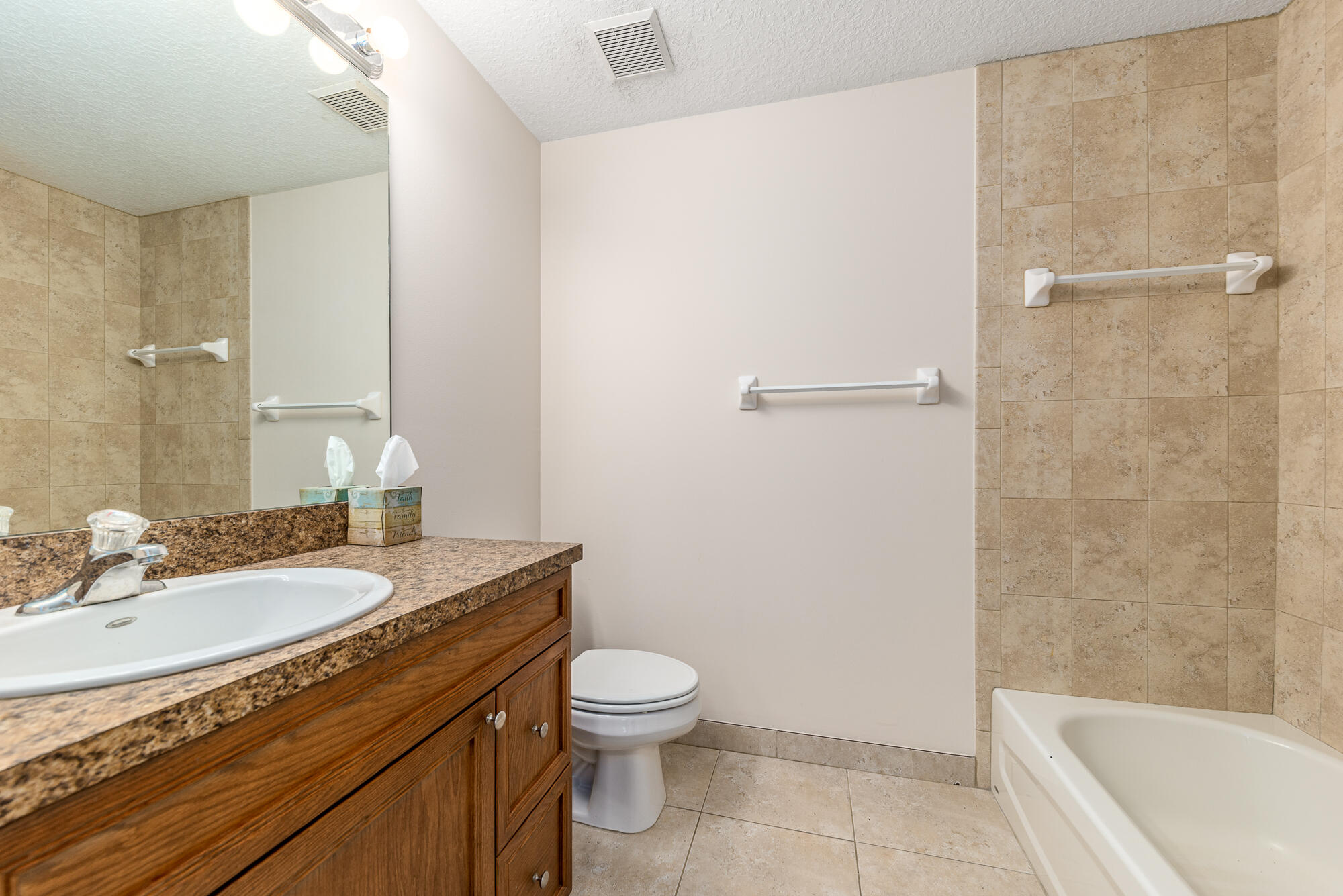 5795 Southeast Mitzi Lane Stuart, FL 34997 - Photo 12 of 16 Guest Bathroom