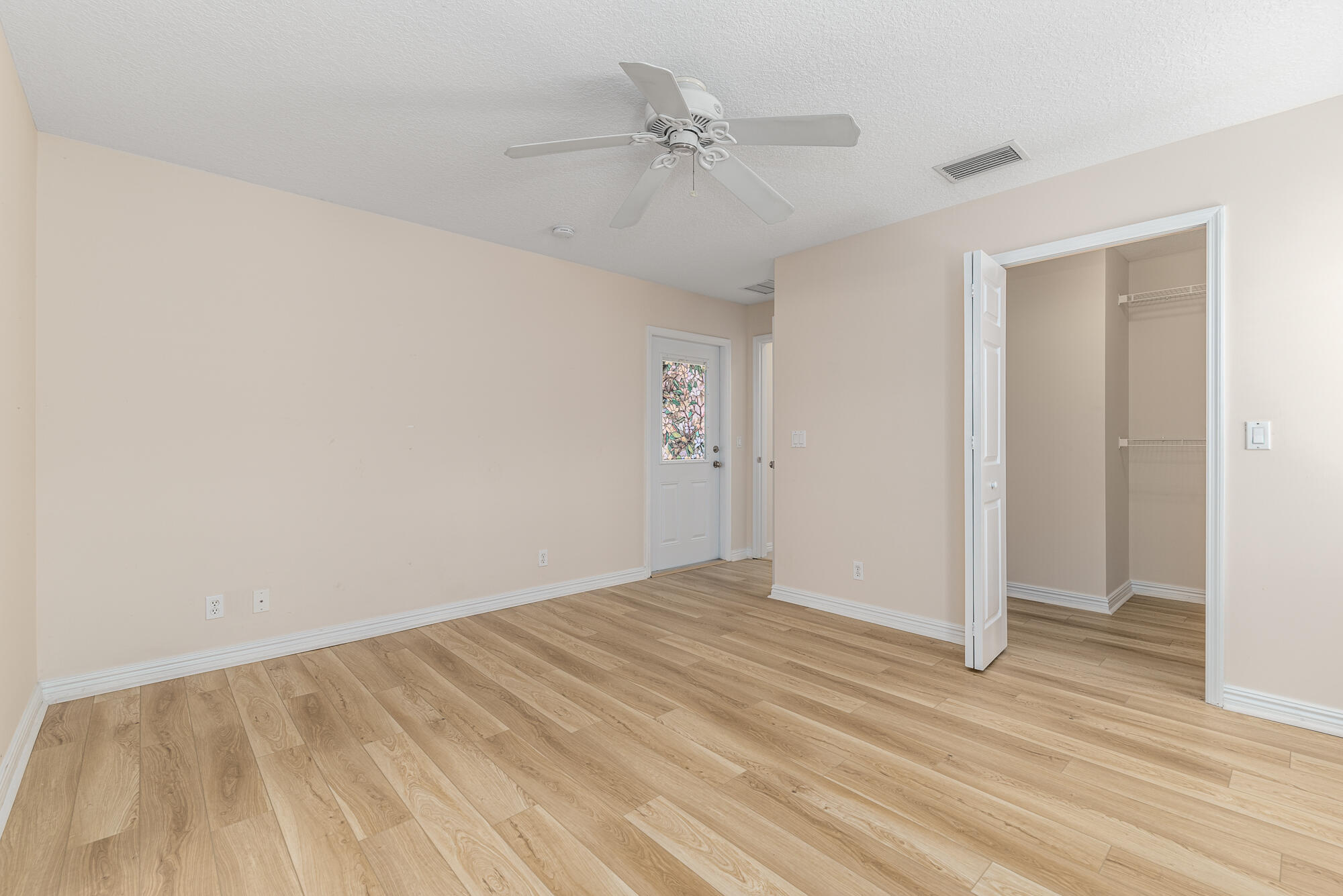 5795 Southeast Mitzi Lane Stuart, FL 34997 - Photo 6 of 16 Primary Bedroom