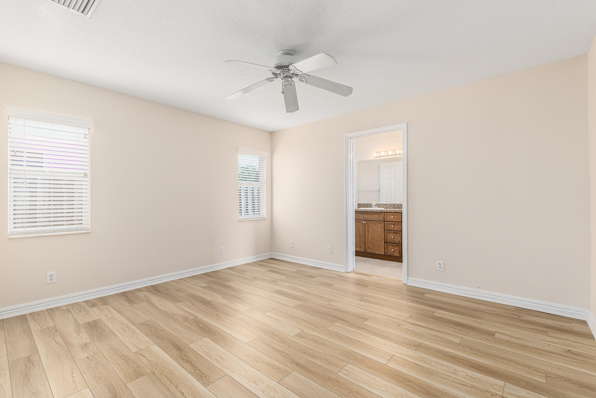 5795 Southeast Mitzi Lane Stuart, FL 34997 - Photo 7 of 16 Primary Bedroom