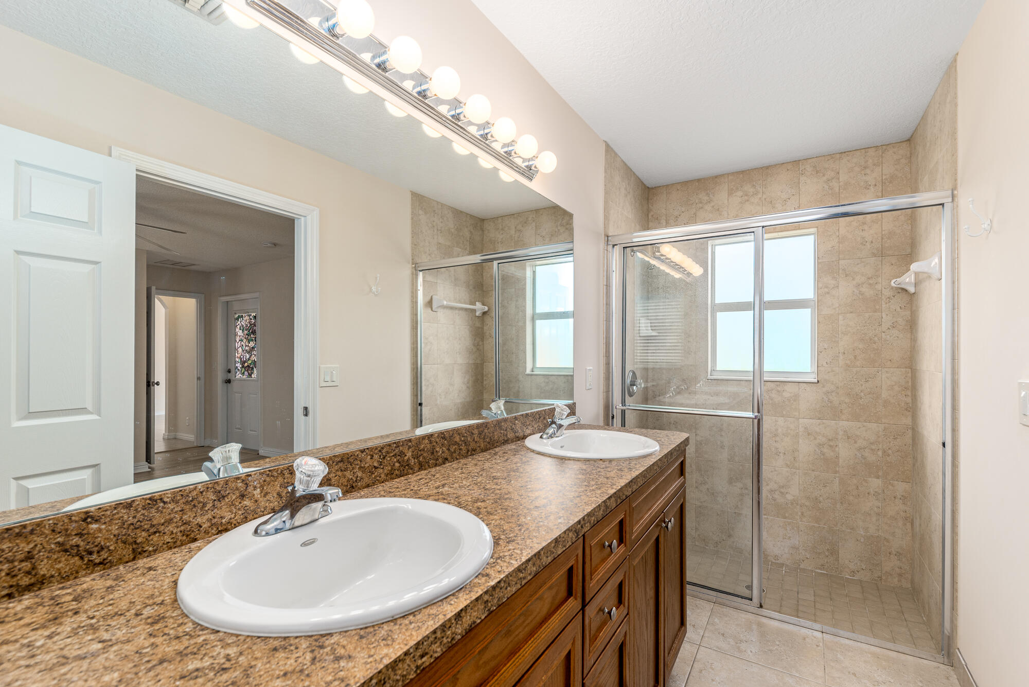 5795 Southeast Mitzi Lane Stuart, FL 34997 - Photo 9 of 16 Primary Bathroom