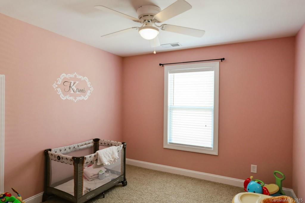 1628 Ridgehaven Road Waxhaw, NC 28173 - Photo 15 of 24 a room with window and ceiling fan