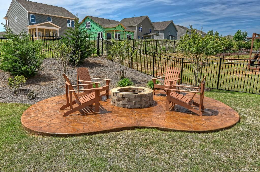 1628 Ridgehaven Road Waxhaw, NC 28173 - Photo 18 of 24 a view of a house with backyard porch and sitting area