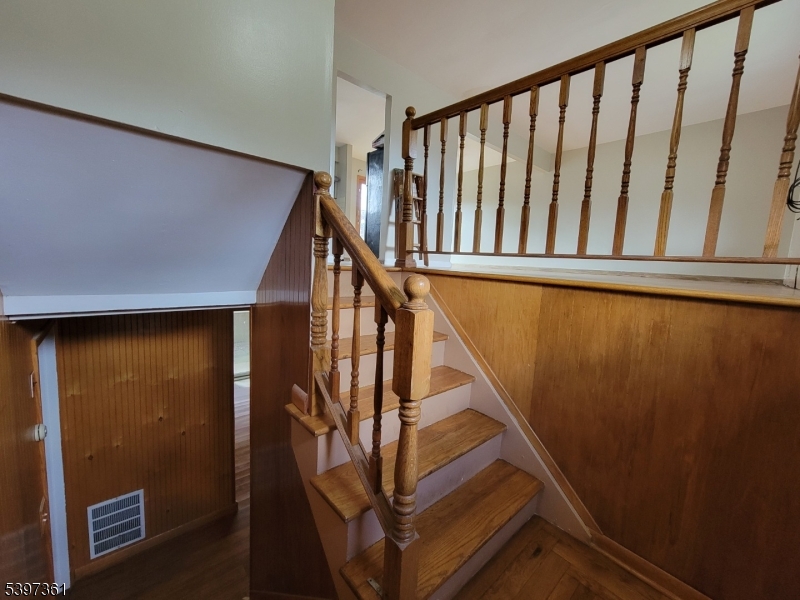 10 Richards Road Hopatcong, NJ 07843 - Photo 14 of 18 a view of staircase with railing and white walls