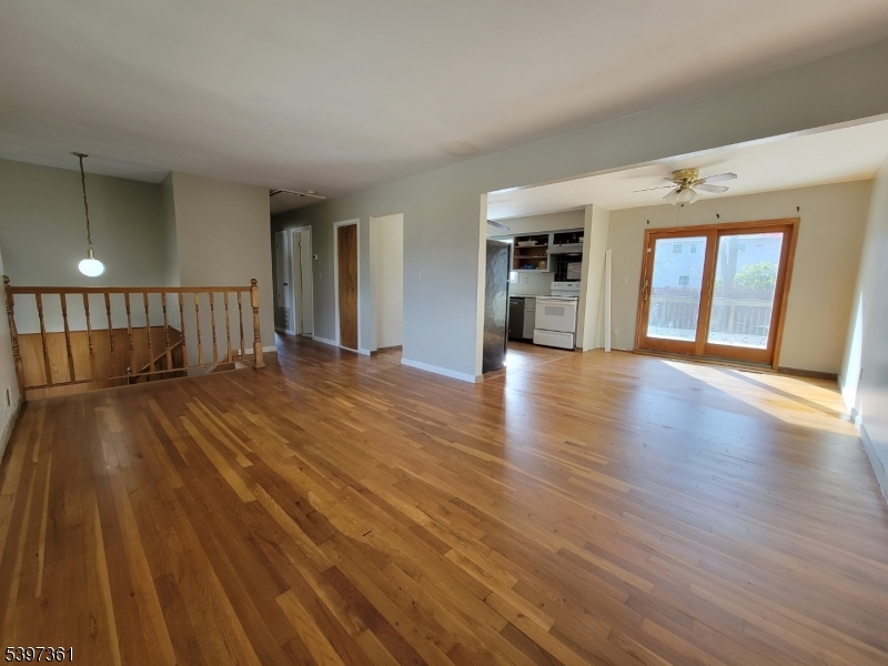 10 Richards Road Hopatcong, NJ 07843 - Photo 3 of 18 a view of a room with wooden floor and a window