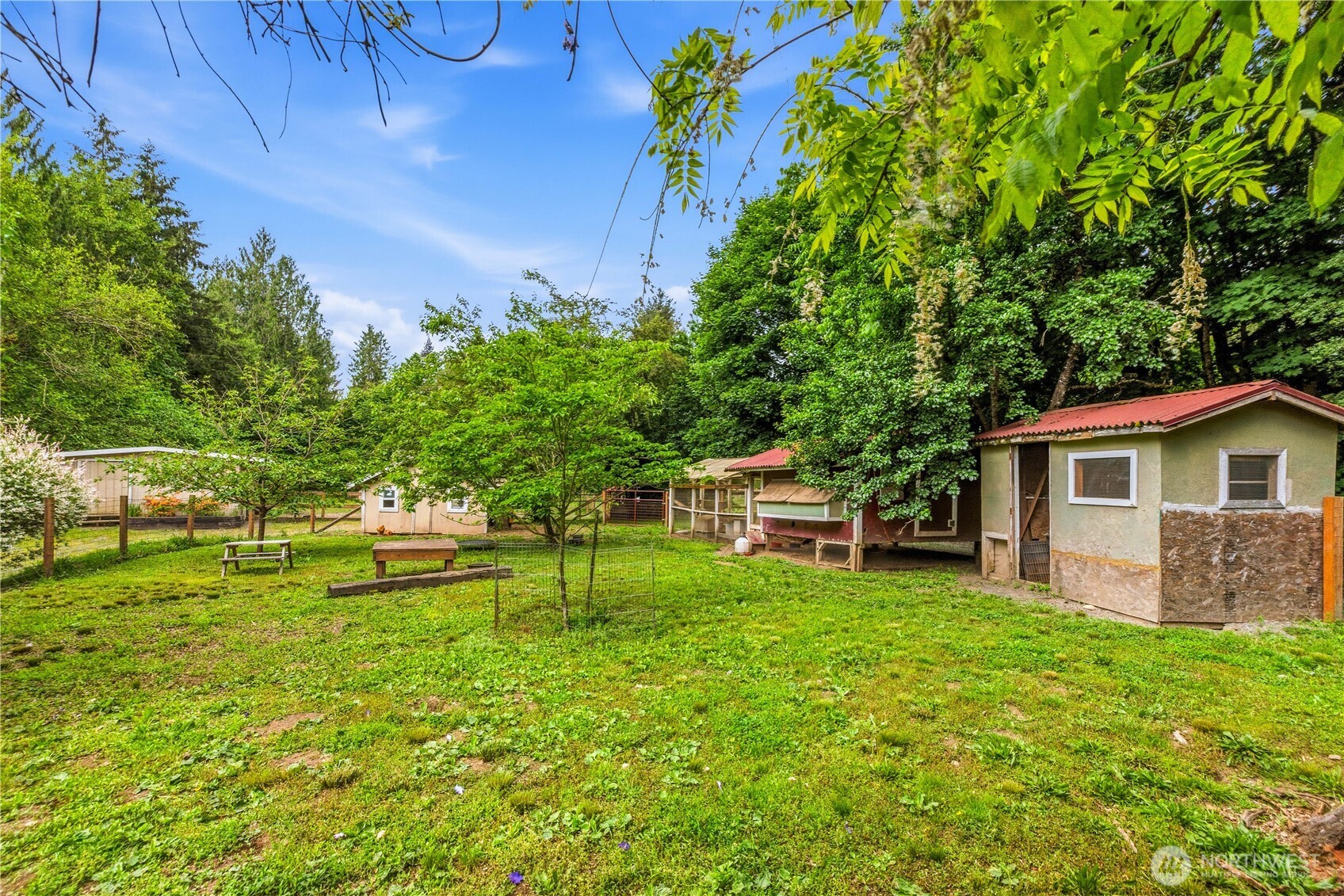 24522 Cromwell Road Monroe, WA 98272 - Photo 31 of 40 a view of a backyard with a garden