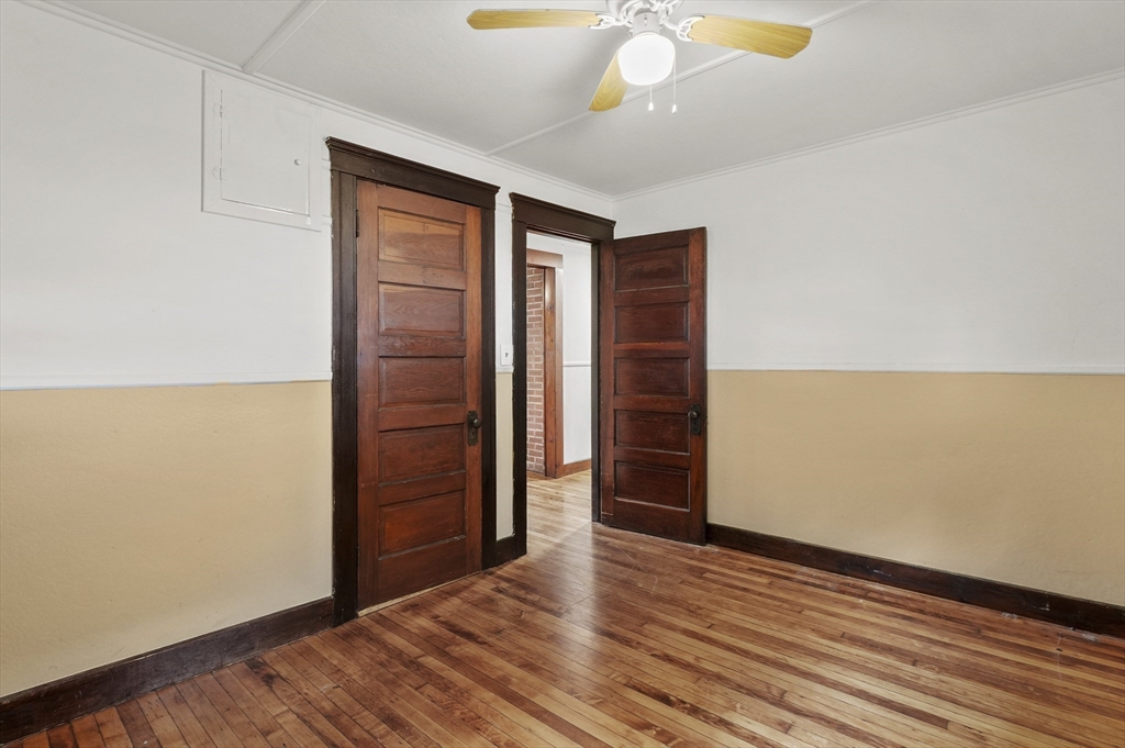 3 Cranberry Meadow Shore Road Charlton, MA 01507 - Photo 16 of 39 an empty room with wooden floor and closet