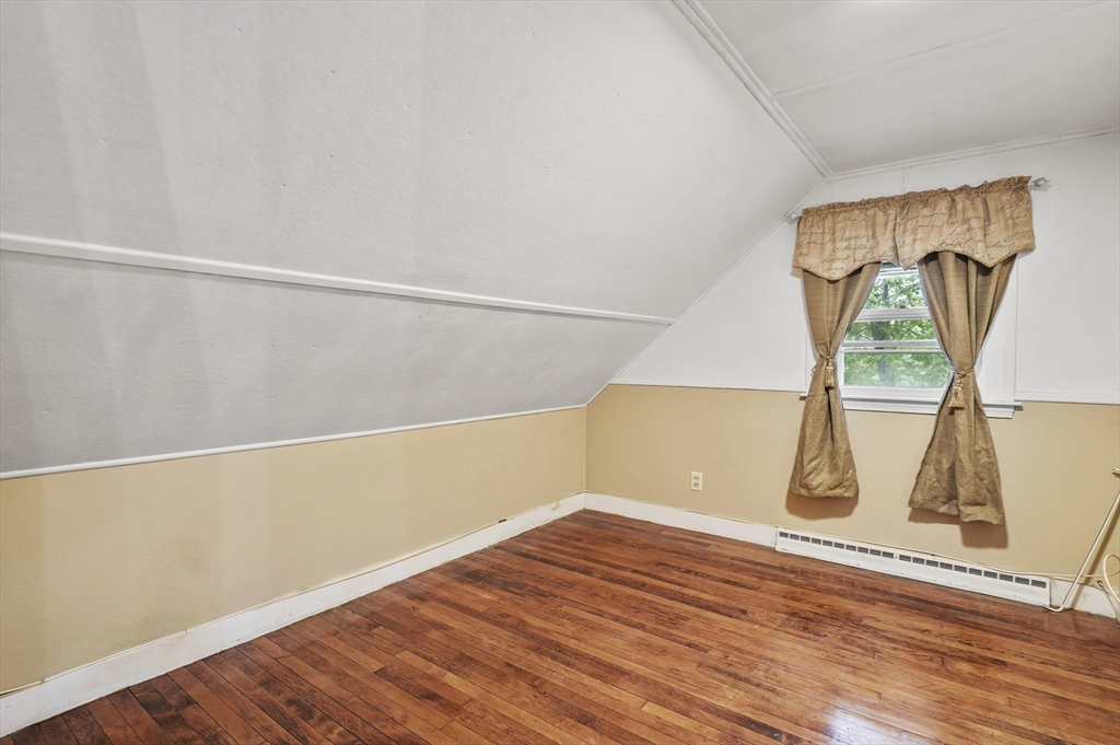 3 Cranberry Meadow Shore Road Charlton, MA 01507 - Photo 19 of 39 a view of a room with wooden floor and white walls