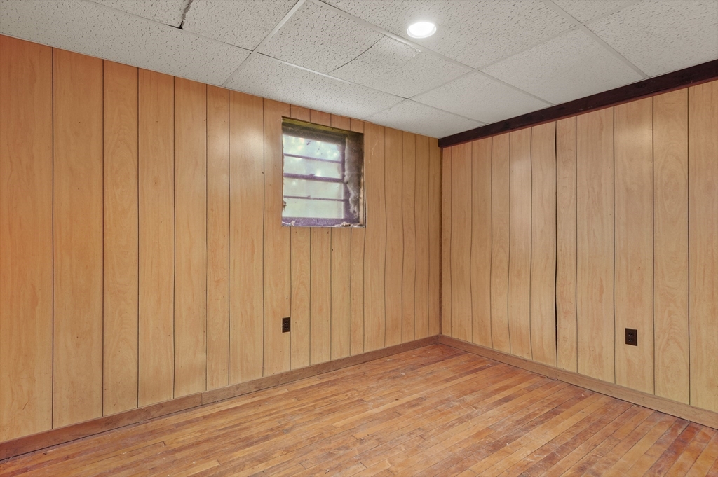 3 Cranberry Meadow Shore Road Charlton, MA 01507 - Photo 28 of 39 a view of an empty room with wooden floor