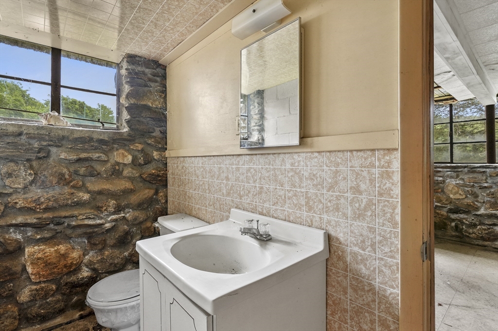 3 Cranberry Meadow Shore Road Charlton, MA 01507 - Photo 31 of 39 a bathroom with a sink and toilet