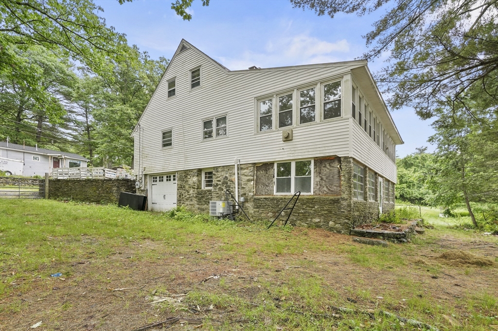 3 Cranberry Meadow Shore Road Charlton, MA 01507 - Photo 35 of 39 a view of a house with backyard and trees