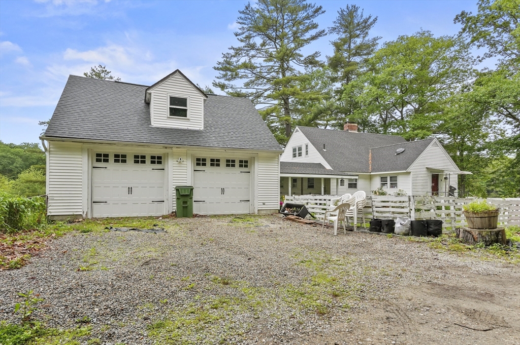 3 Cranberry Meadow Shore Road Charlton, MA 01507 - Photo 5 of 39 a big house with a large tree in front of it