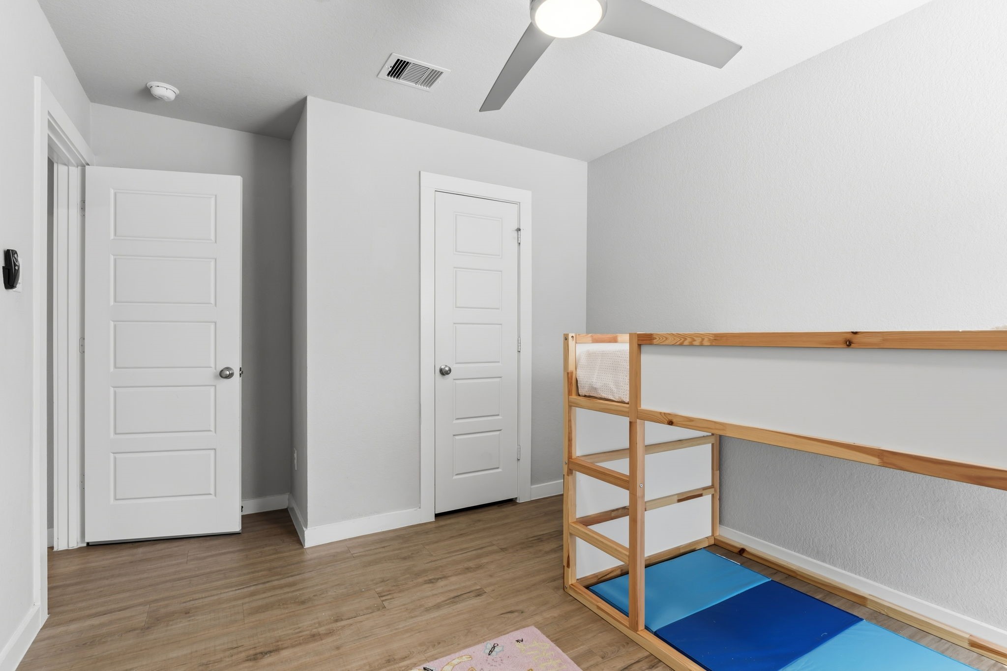 14914 Big Bend Ranch Drive Cypress, TX 77433 - Photo 35 of 49 an empty room with wooden floor and windows