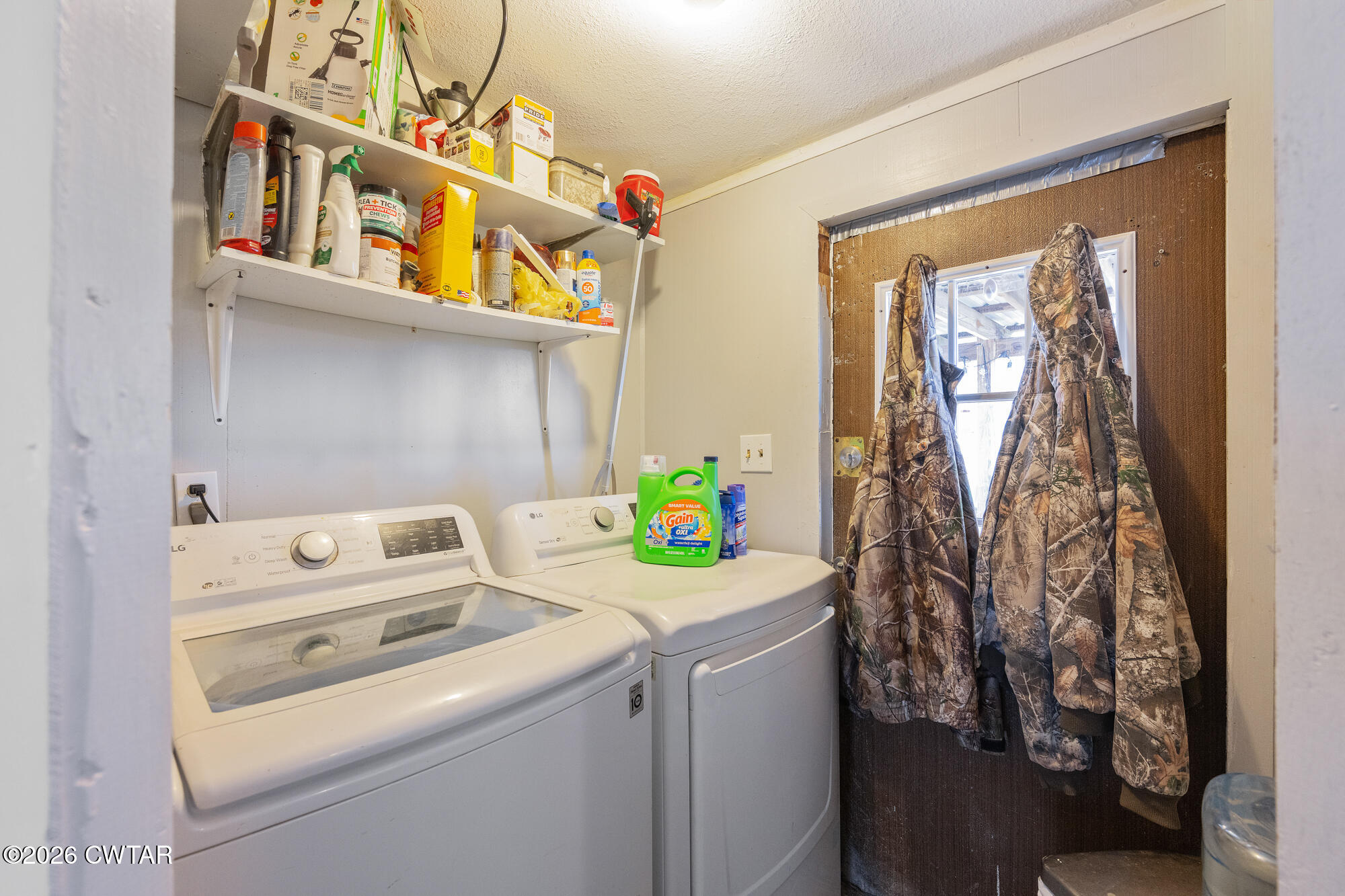 21 Deercrest Lane Lexington, TN 38351 - Photo 16 of 24 a utility room with dryer and washer