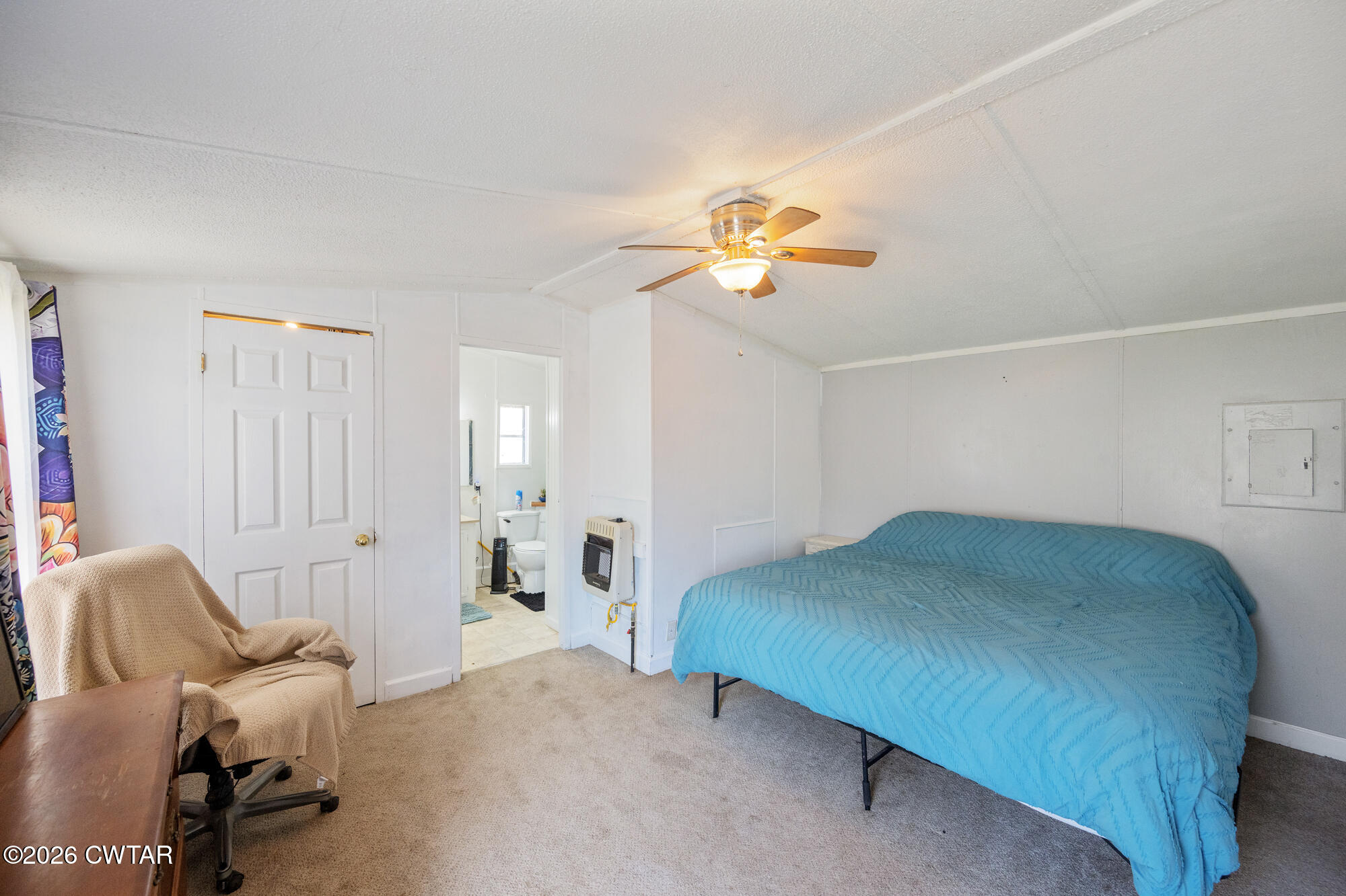 21 Deercrest Lane Lexington, TN 38351 - Photo 9 of 24 a bedroom with a bed and ceiling fan