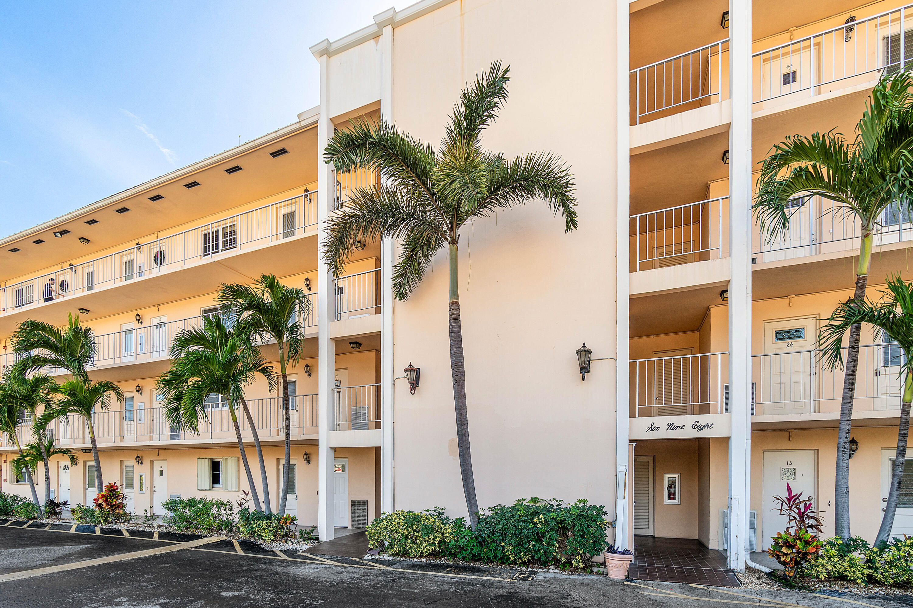 698 Northeast Spanish River Boulevard, Unit 140 Boca Raton, FL 33431 - Photo 19 of 21 a front view of a building