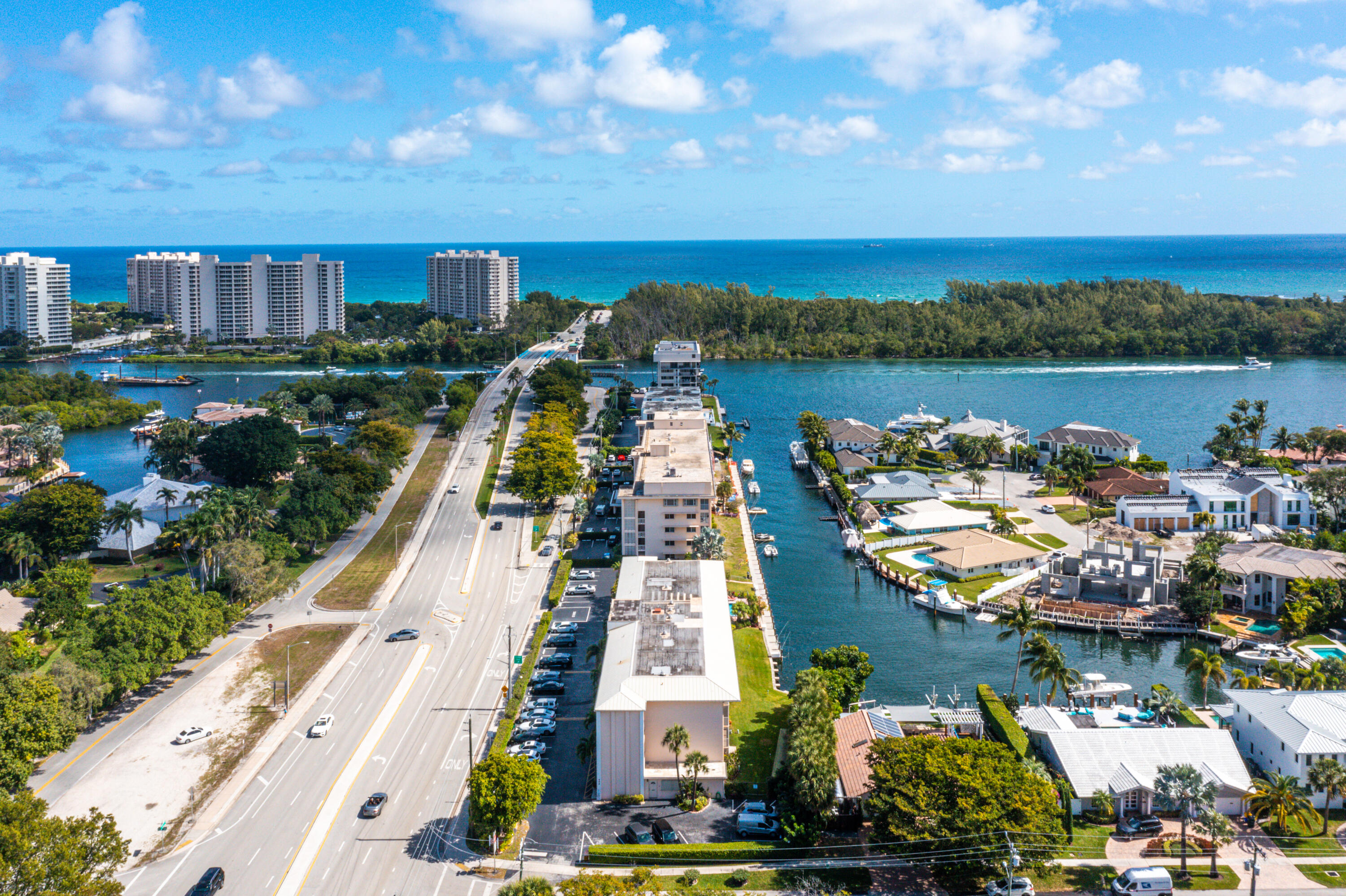698 Northeast Spanish River Boulevard, Unit 140 Boca Raton, FL 33431 - Photo 21 of 21 an aerial view of a house with lake view