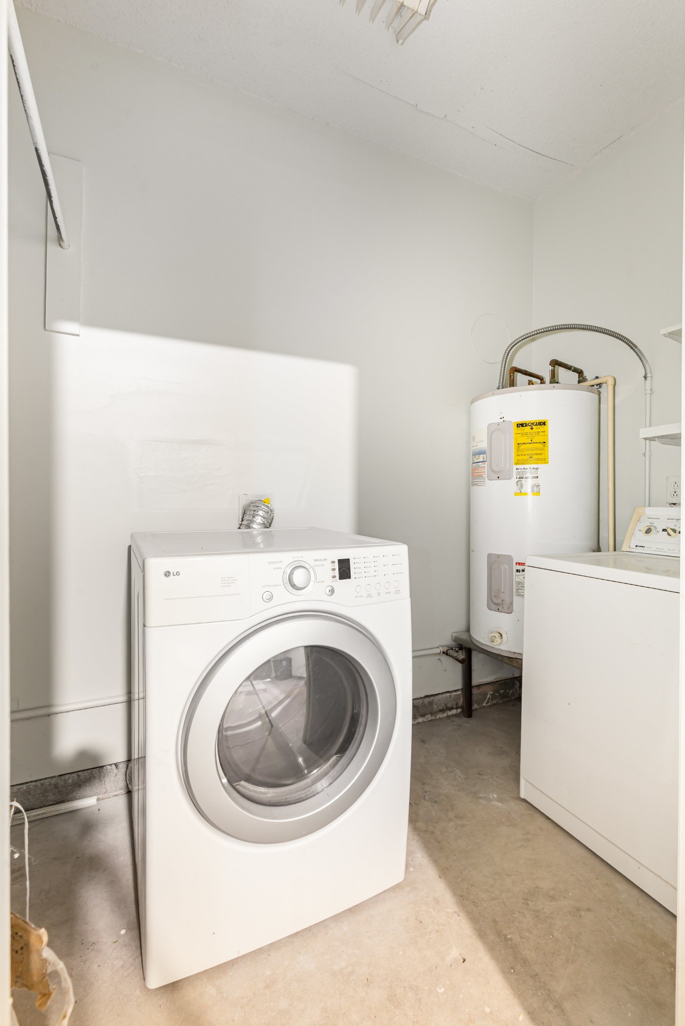 118 Brevet Drive Franklin, TN 37064 - Photo 17 of 18 a utility room with dryer and washer