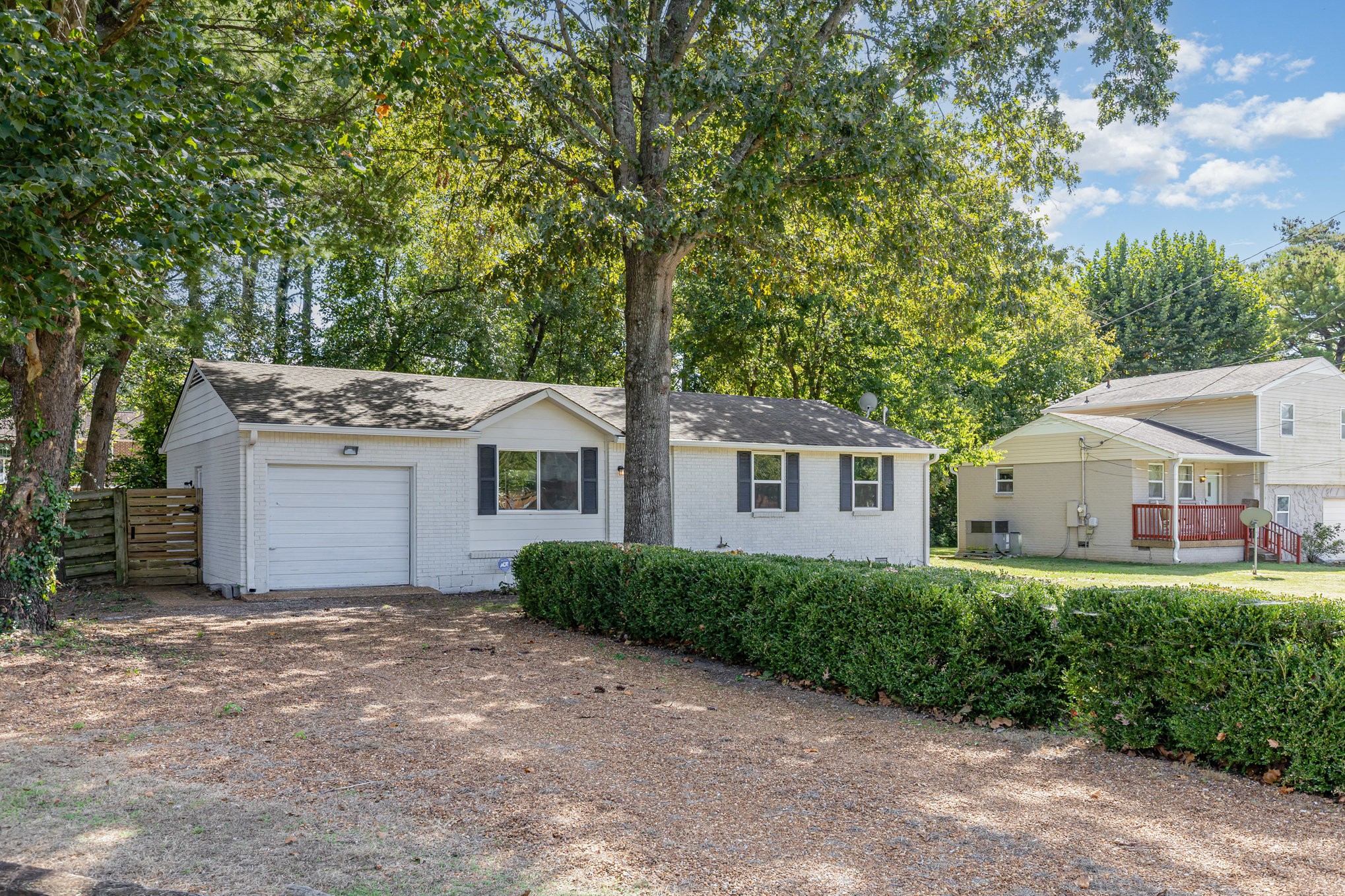 118 Brevet Drive Franklin, TN 37064 - Photo 2 of 18 a front view of a house with a yard and garage