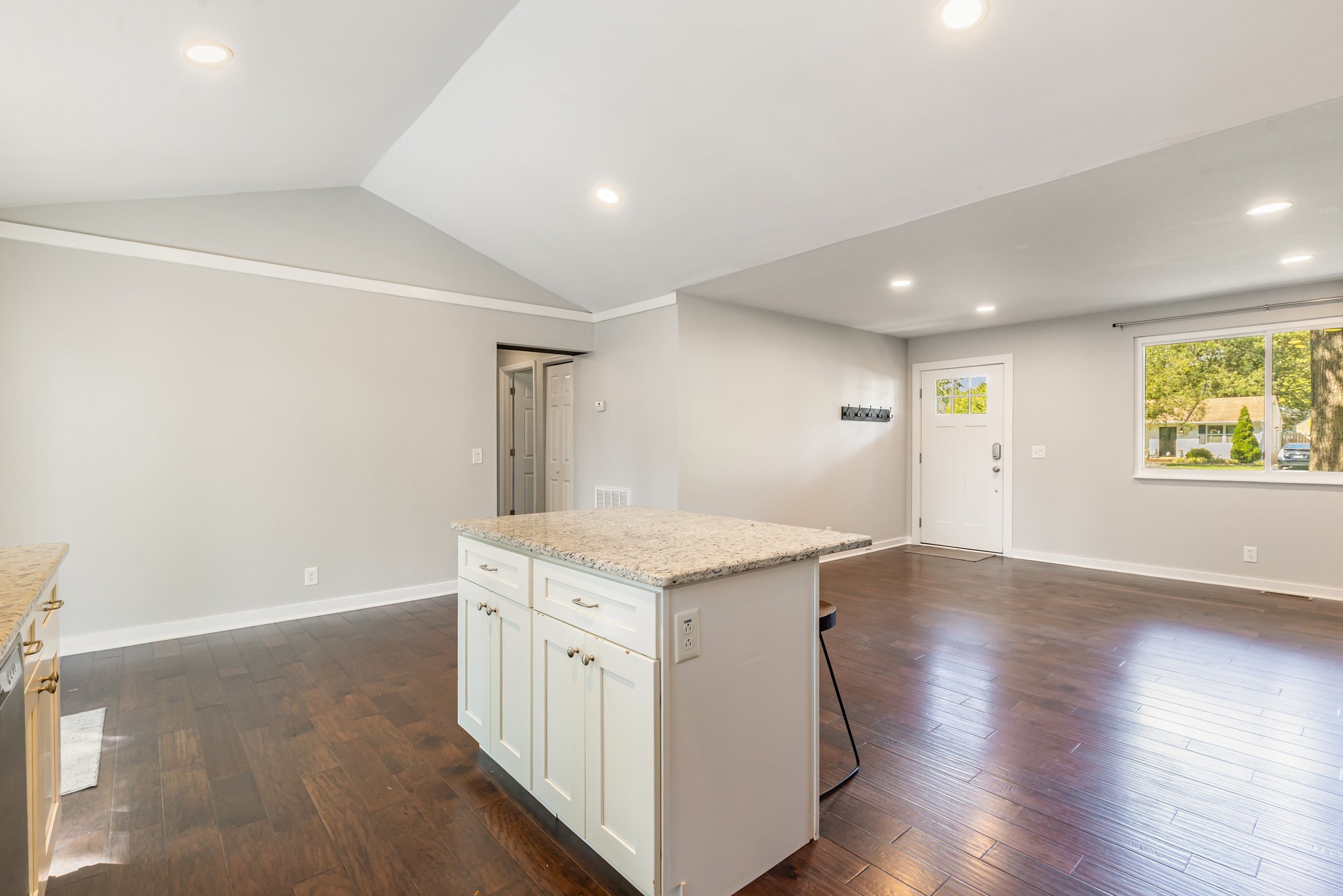 118 Brevet Drive Franklin, TN 37064 - Photo 10 of 18 an entryway and an empty room with wooden floor