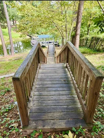 a view of a balcony with wooden floor