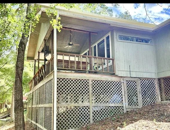 a living room with a table or chairs and a wooden floor