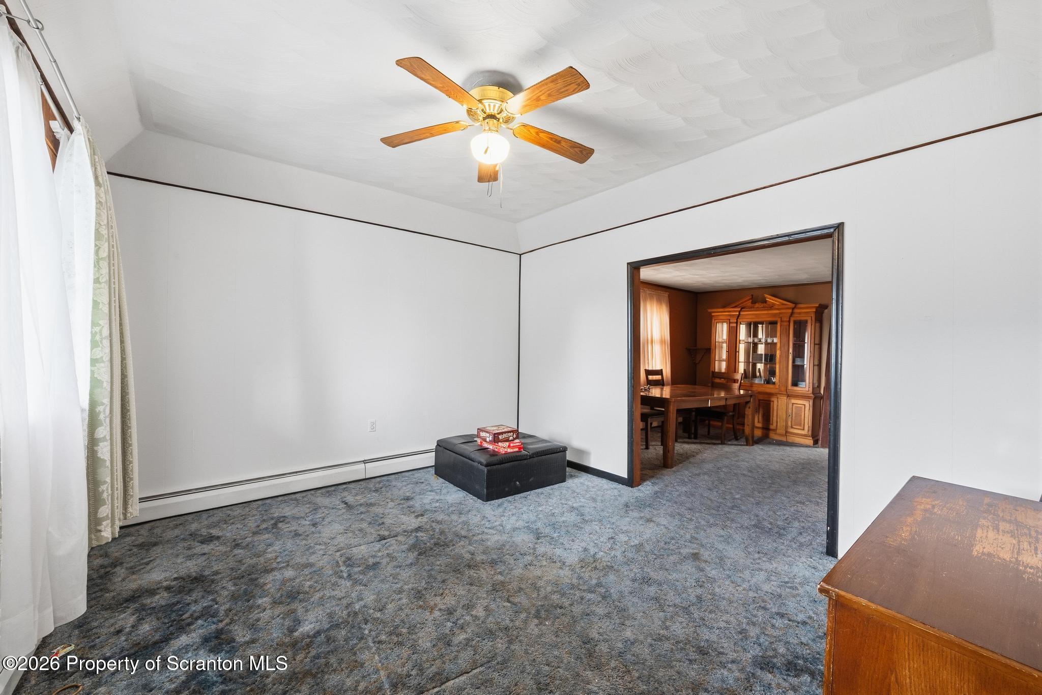 810 Pine Street Mayfield, PA 18433 - Photo 13 of 37 a room with ceiling fan