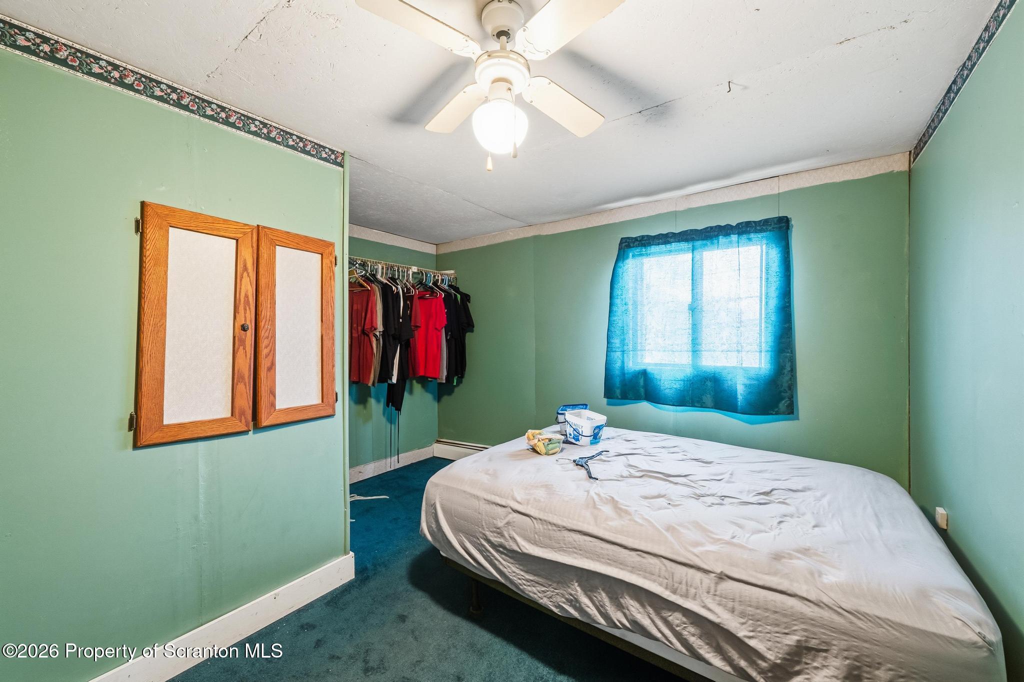 810 Pine Street Mayfield, PA 18433 - Photo 25 of 37 a bedroom with a bed and a window