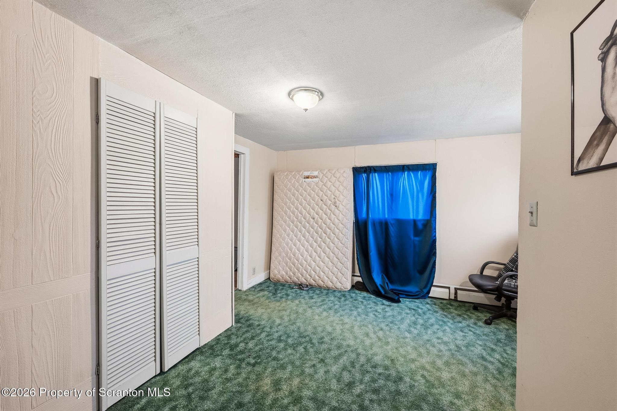 810 Pine Street Mayfield, PA 18433 - Photo 26 of 37 a view of an empty room with closet