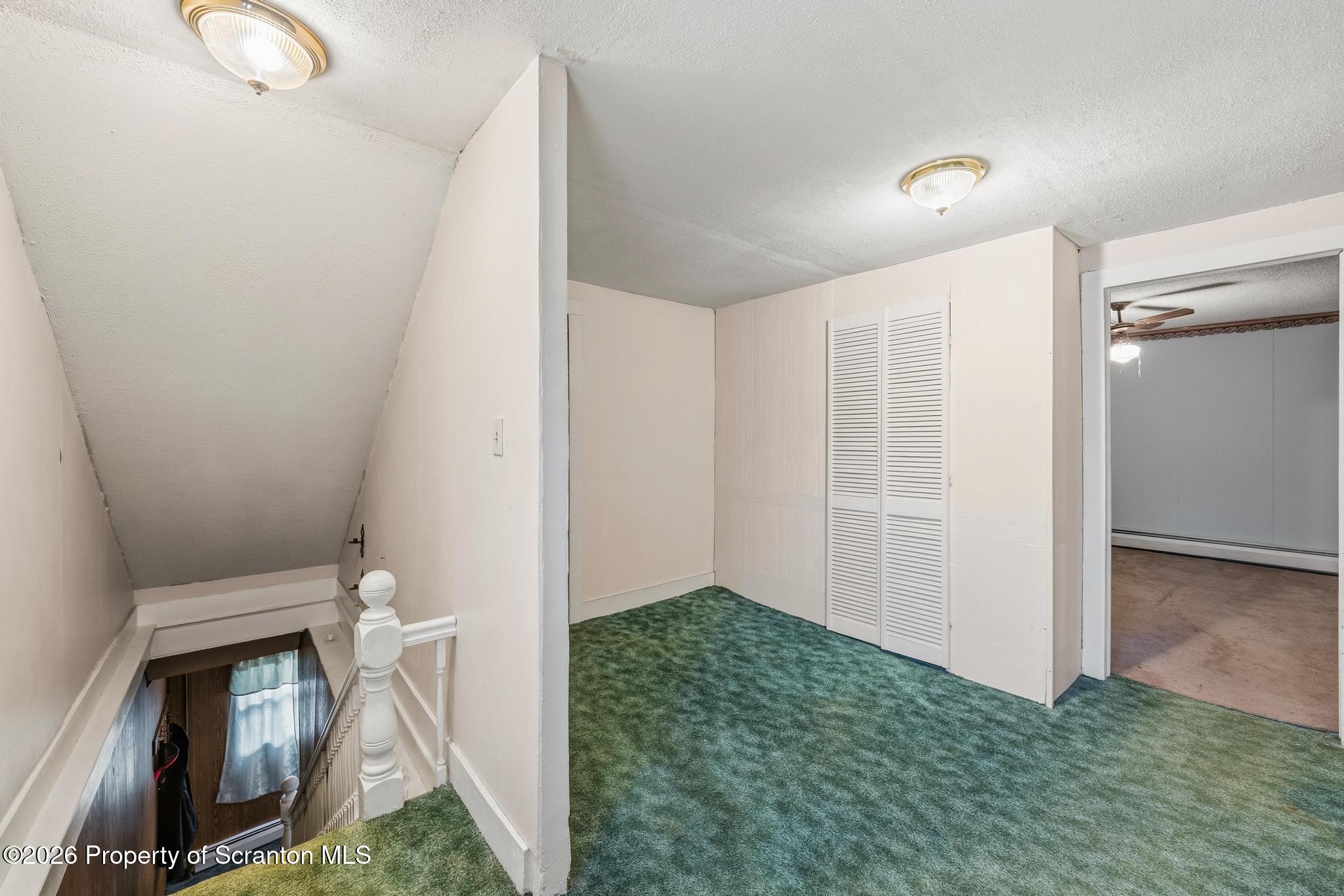 810 Pine Street Mayfield, PA 18433 - Photo 28 of 37 a view of a room that has a fireplace