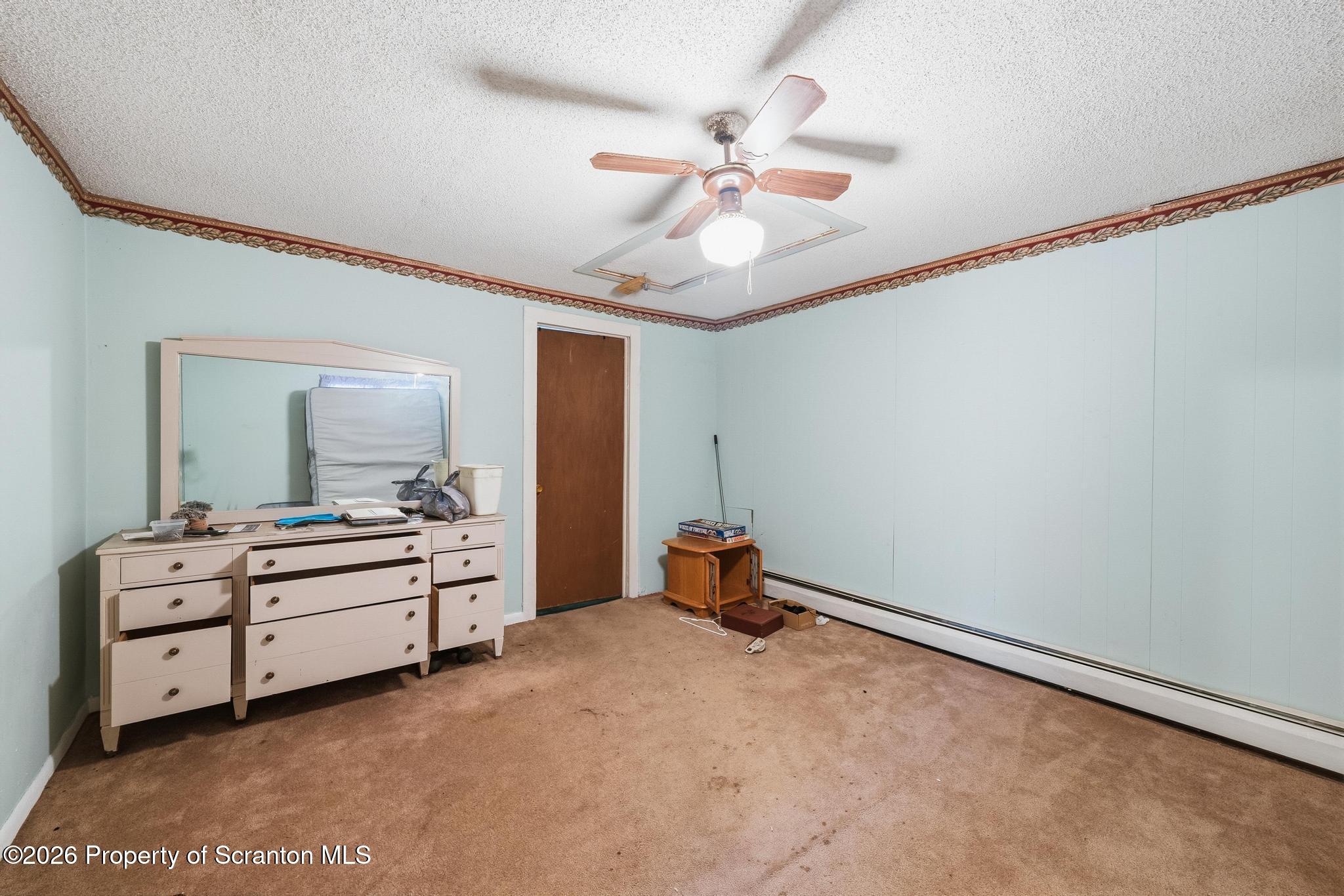 810 Pine Street Mayfield, PA 18433 - Photo 29 of 37 a room with chandelier fan and windows