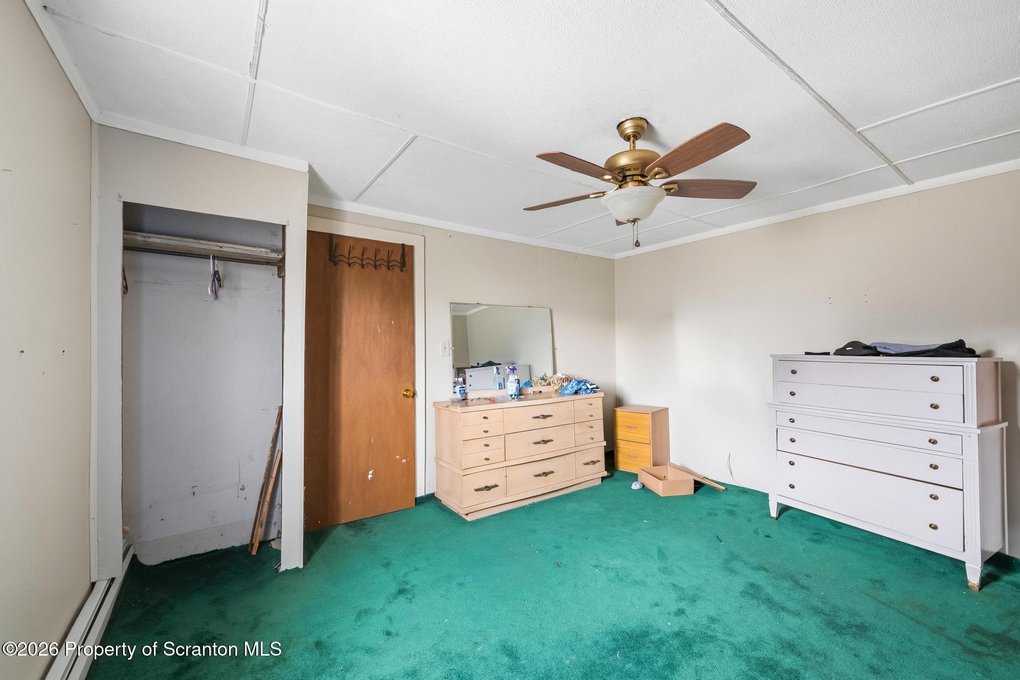 810 Pine Street Mayfield, PA 18433 - Photo 32 of 37 a room with furniture and a ceiling fan