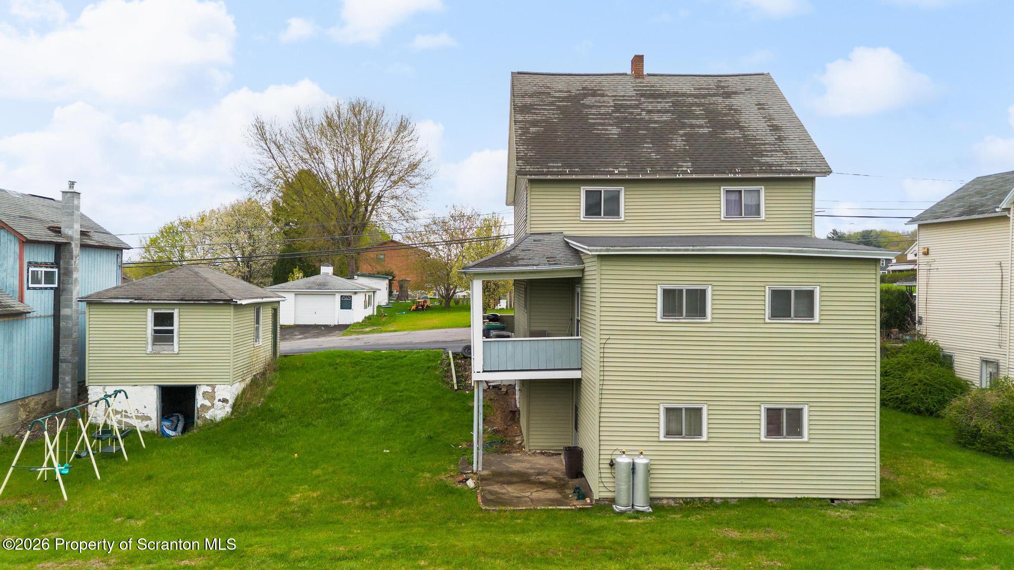 810 Pine Street Mayfield, PA 18433 - Photo 6 of 37 a front view of house with yard