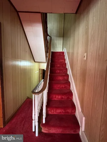 a view of empty room with windows