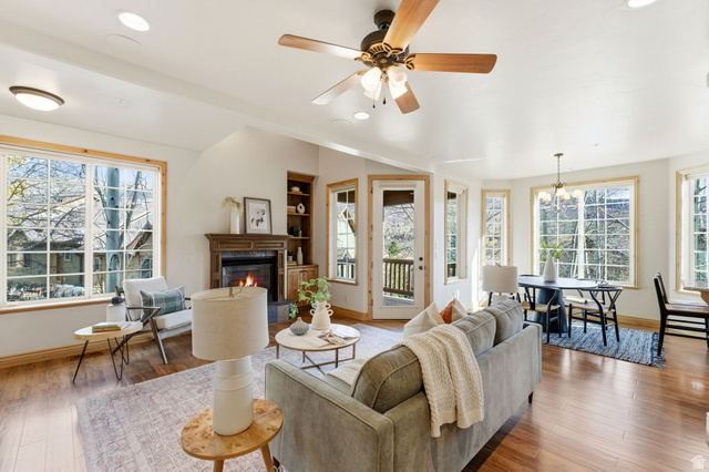 3026 Lower Saddleback Road Park City, UT 84098 - Photo 4 of 71 Living room featuring a tiled fireplace, healthy amount of natural light, ceiling fan, hardwood / wood-style floors, and recessed lighting