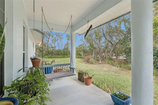 a very nice looking room with a large window and red walls
