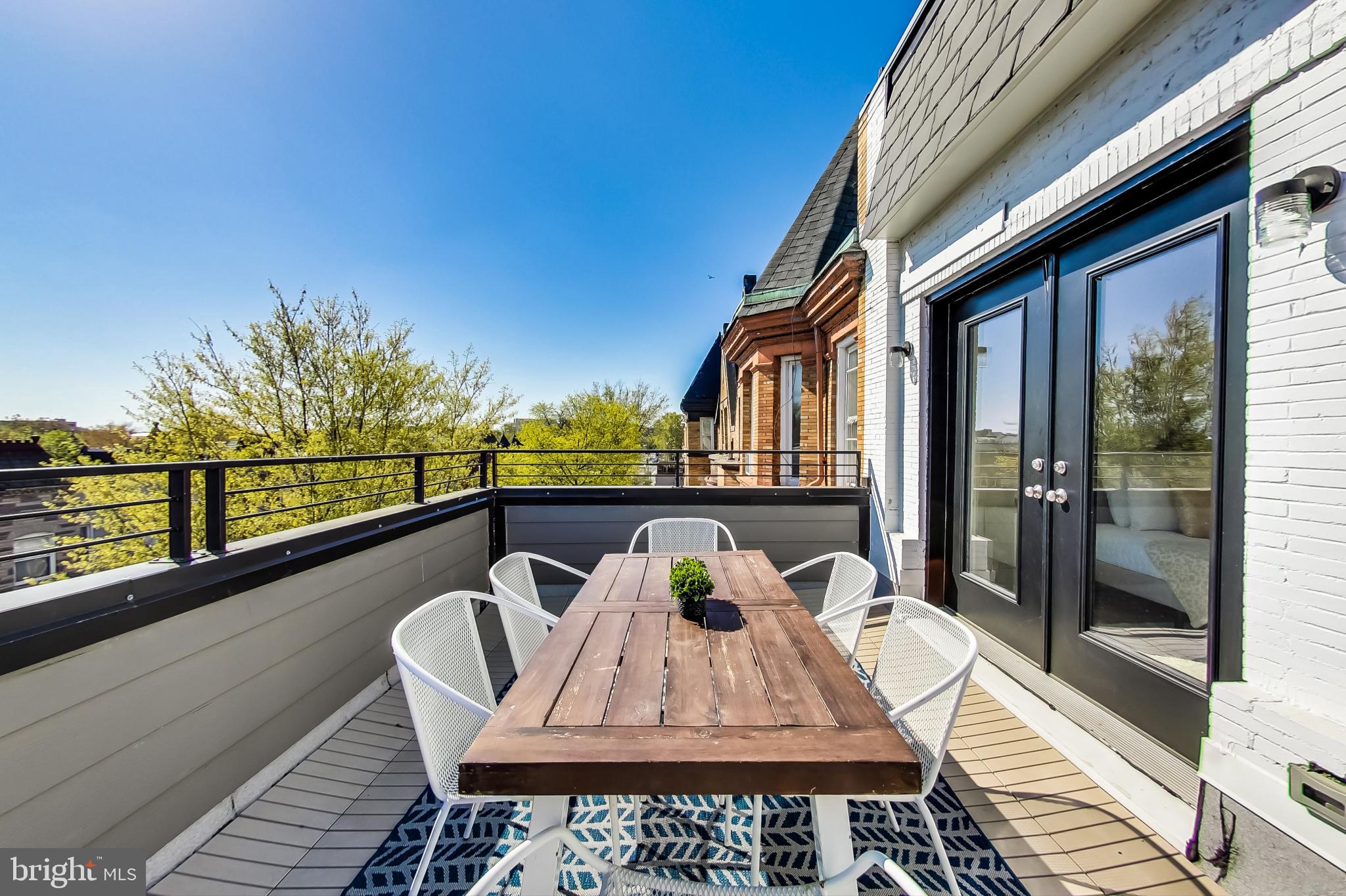 207 Florida Avenue Northwest, Unit 3 Washington, DC 20001 - Photo 21 of 34 a view of a balcony with furniture