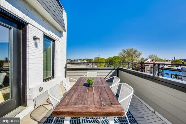 a view of swimming pool from a balcony